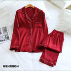 Red satin pajama set on a white surface with 'Mehroon' branding.
