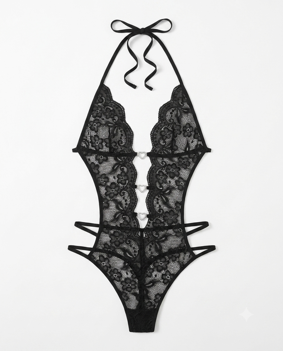 Black lace halter bodysuit with strappy details and a tie-neck bow, shown flat against a white background.