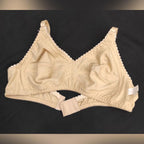 Beige bra on a black background