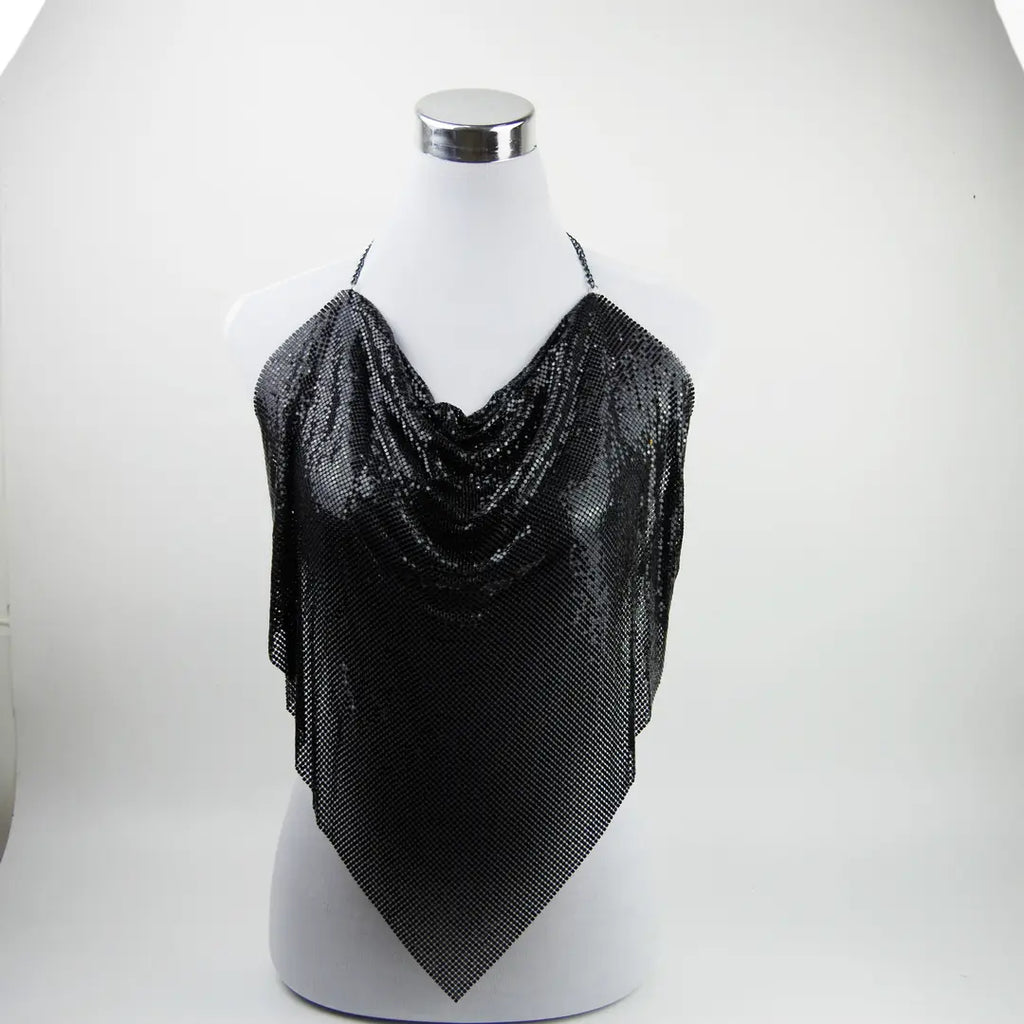 A black sequined mesh halter top draped over a white mannequin torso, set against a plain white studio background.