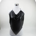 A black sequined mesh halter top draped over a white mannequin torso, set against a plain white studio background.