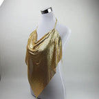 A gold sequined halter-style draped top displayed on a white mannequin torso against a light gray studio background.