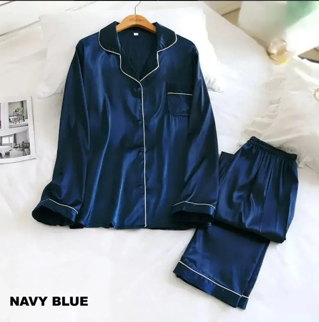Navy blue satin pajama set on a white background with 'NAVY BLUE' text.