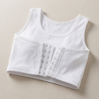 A white ribbed tank top with a built-in underwire bra cup and front hook-and-eye closure, laid flat on a textured beige background.