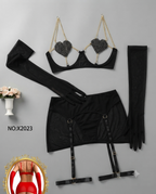 Black lingerie set laid flat on a light gray background, including a bra top with heart-shaped mesh inserts and gold chain straps, a high-waisted garter skirt, matching thigh-high stockings, and a long strap. White text reads 'NO:X2023'.