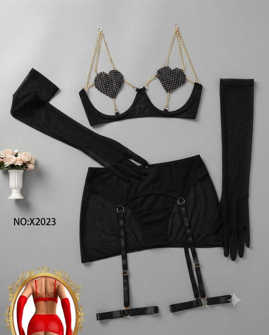 Black lingerie set laid flat on a light gray background, including a bra top with heart-shaped mesh inserts and gold chain straps, a high-waisted garter skirt, matching thigh-high stockings, and a long strap. White text reads 'NO:X2023'.